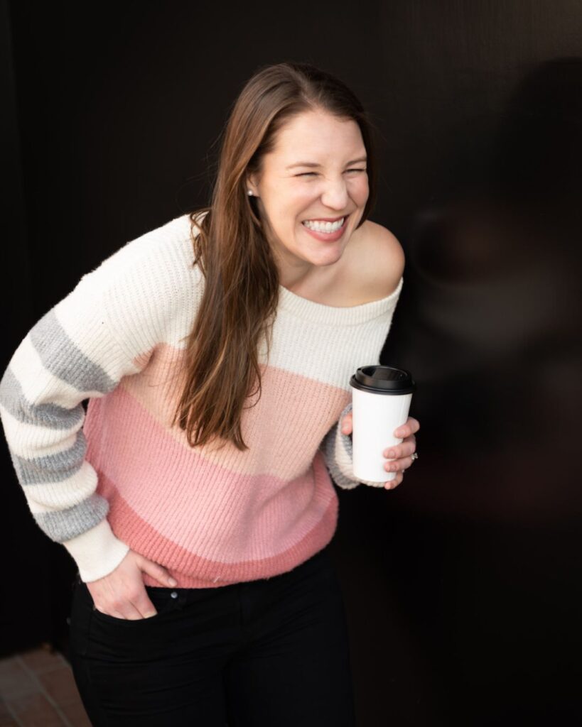 Mikaela Judd Smiling with Coffee IG Portrait
